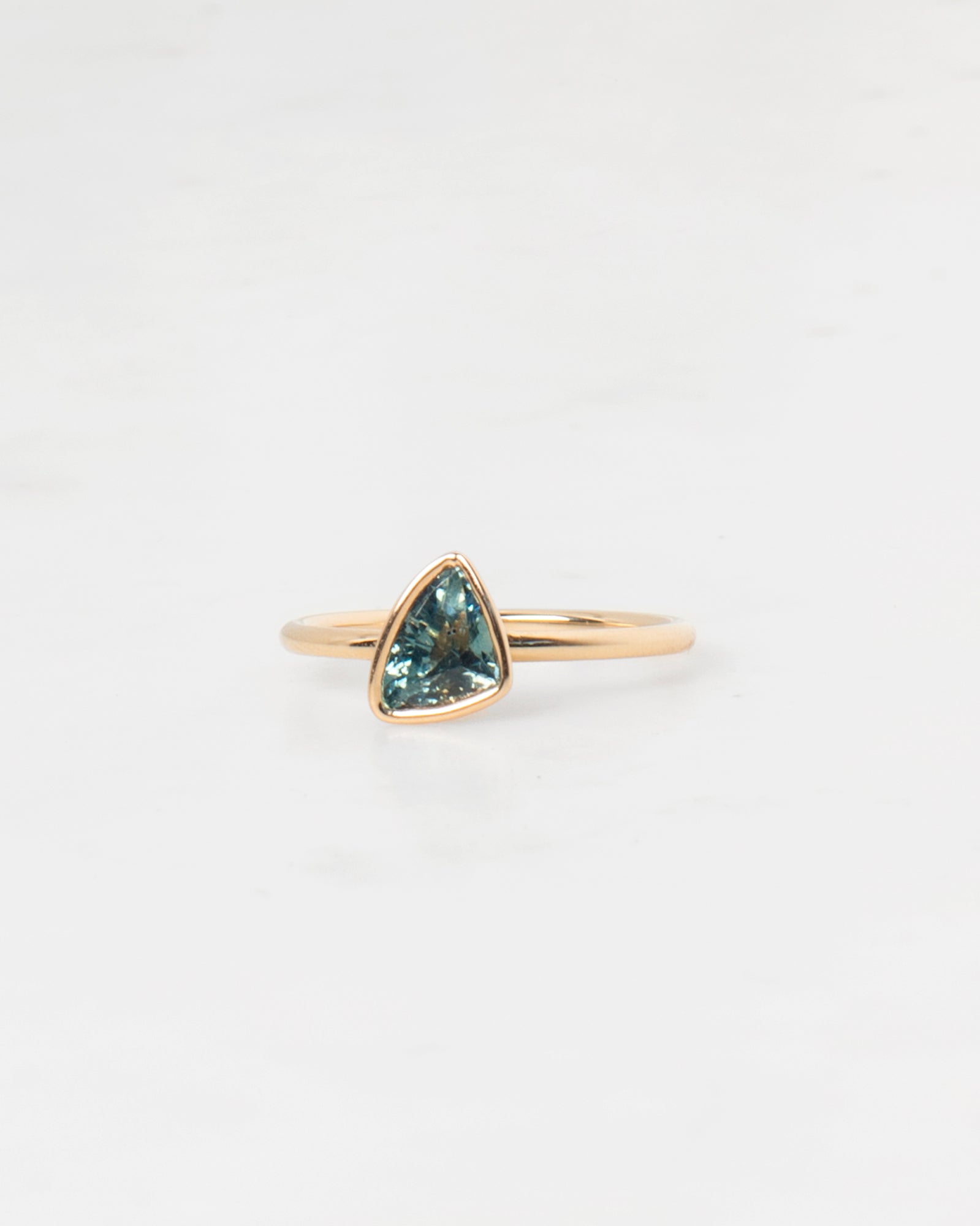 Teal Trillion Cut Floating Sapphire Ring