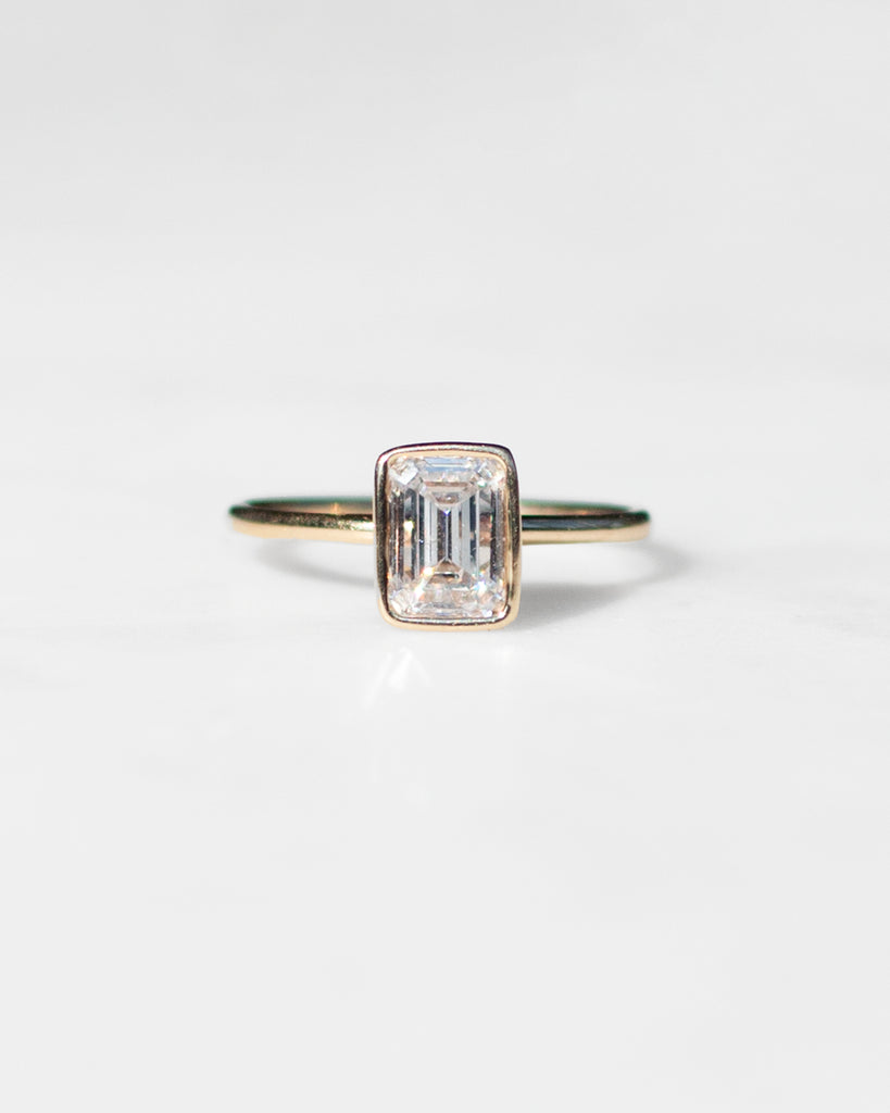 Classic Emerald Cut Floating Diamond Ring