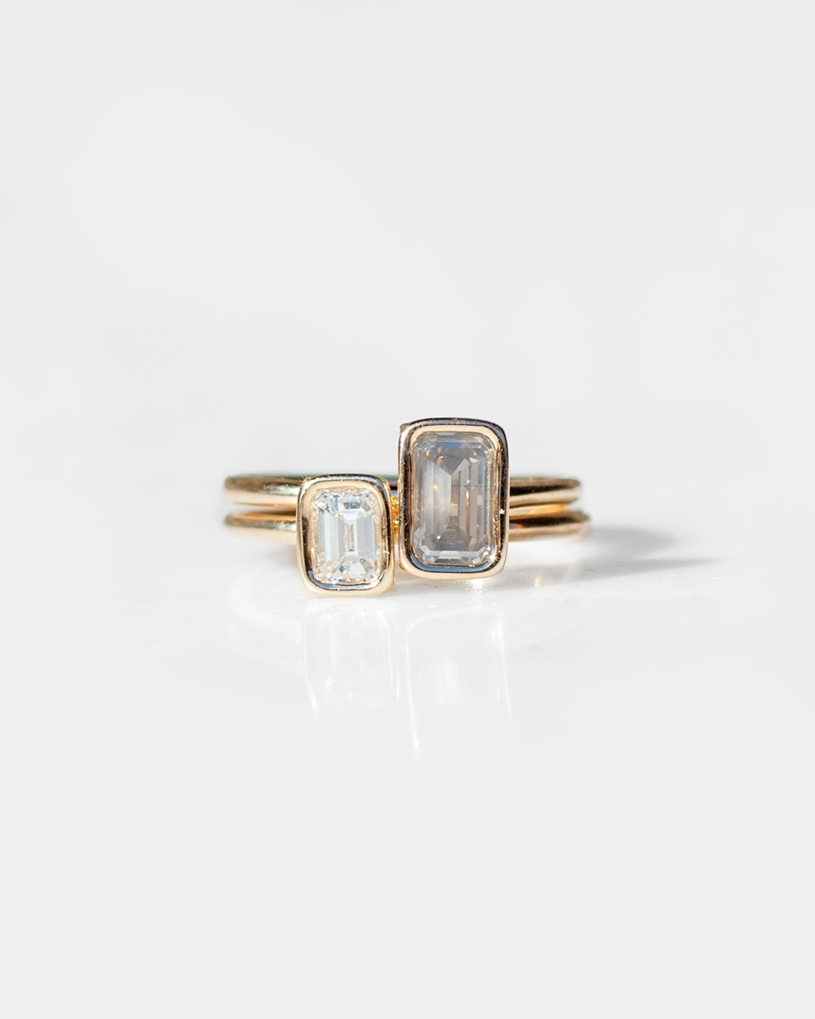 Toi et Moi Diamond Floating Rings - Blue Grey and White Emerald Cut
